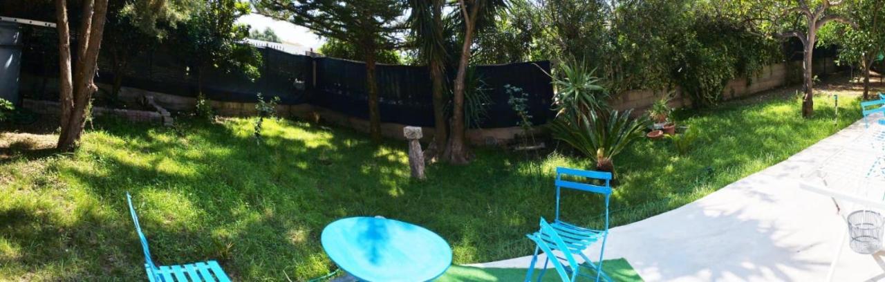 Casa Vacanze"Il Bouganville" คาร์บอเนีย ภายนอก รูปภาพ