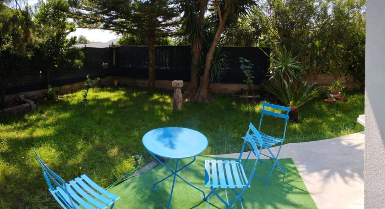 Casa Vacanze"Il Bouganville" คาร์บอเนีย ภายนอก รูปภาพ