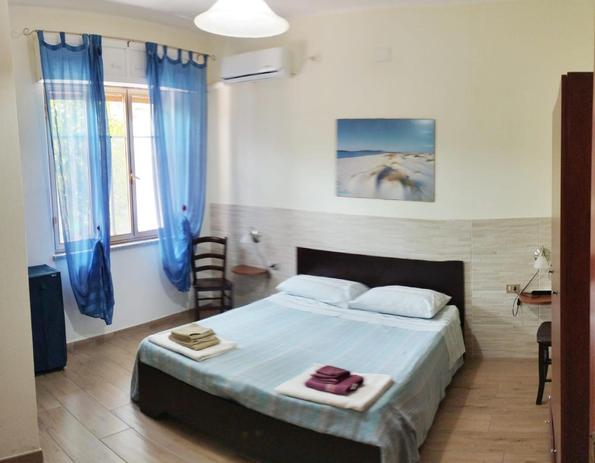 Casa Vacanze"Il Bouganville" คาร์บอเนีย ภายนอก รูปภาพ